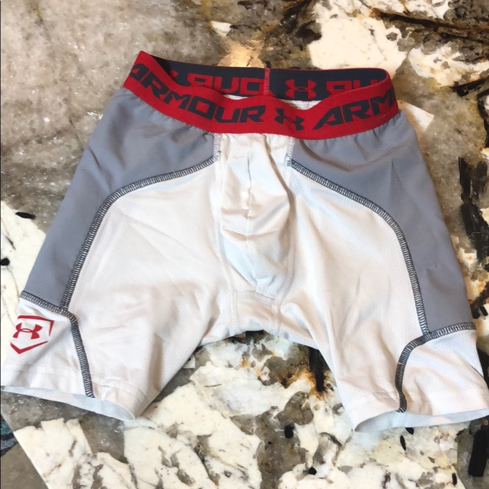 Under Armour sliding shorts, size YSM